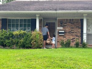 Dubin and little girl, Jewish Community Center of Houston